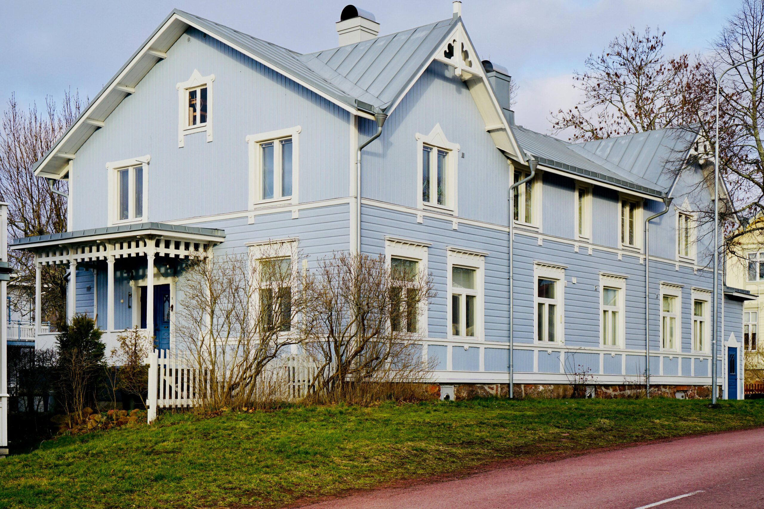 Beautiful blue house in Mariehamn, Åland Islands showcasing Nordic architecture.